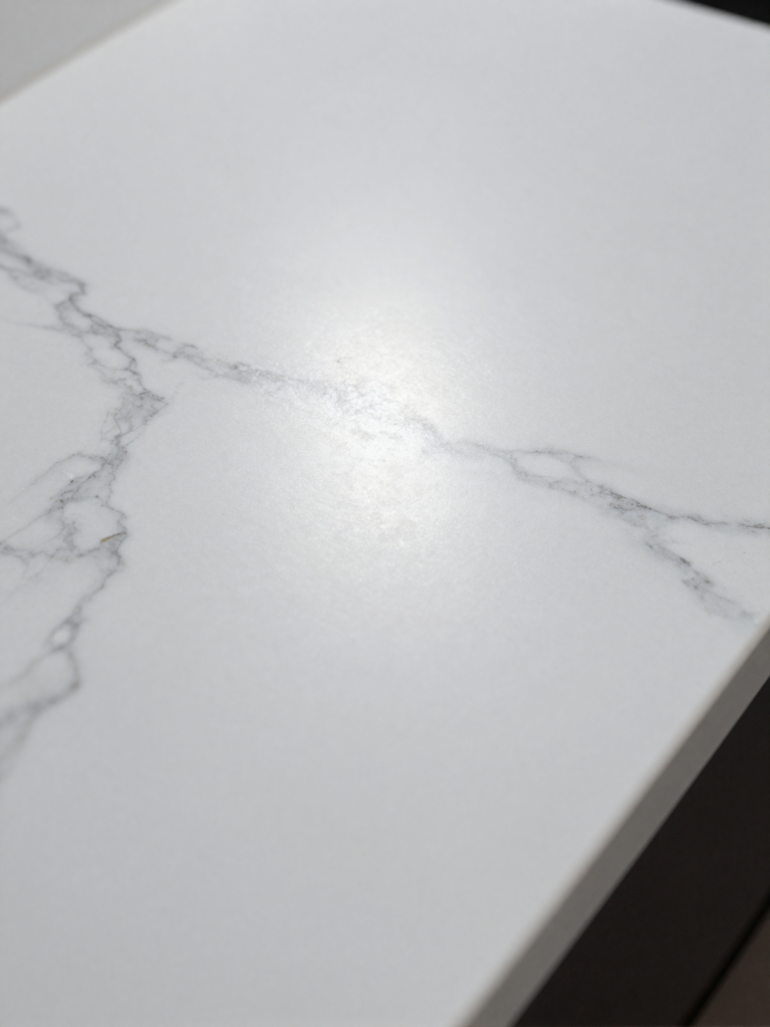 Polished white quartz countertop slab close-up
